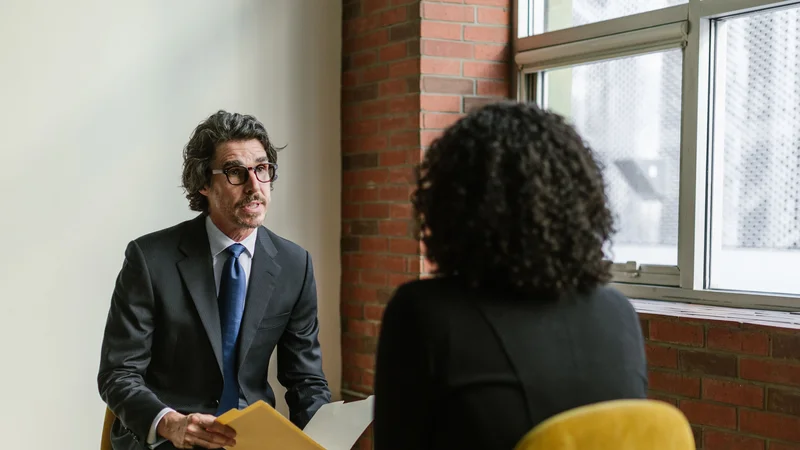 A hiring manager in conversation with a candidate during an interview